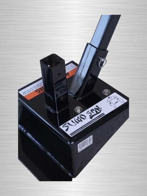 Close-up of the SumoSpin cart’s quick-release pin securing the dual-position handle.